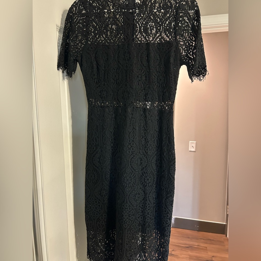 Black short sleeved lace cutout dress